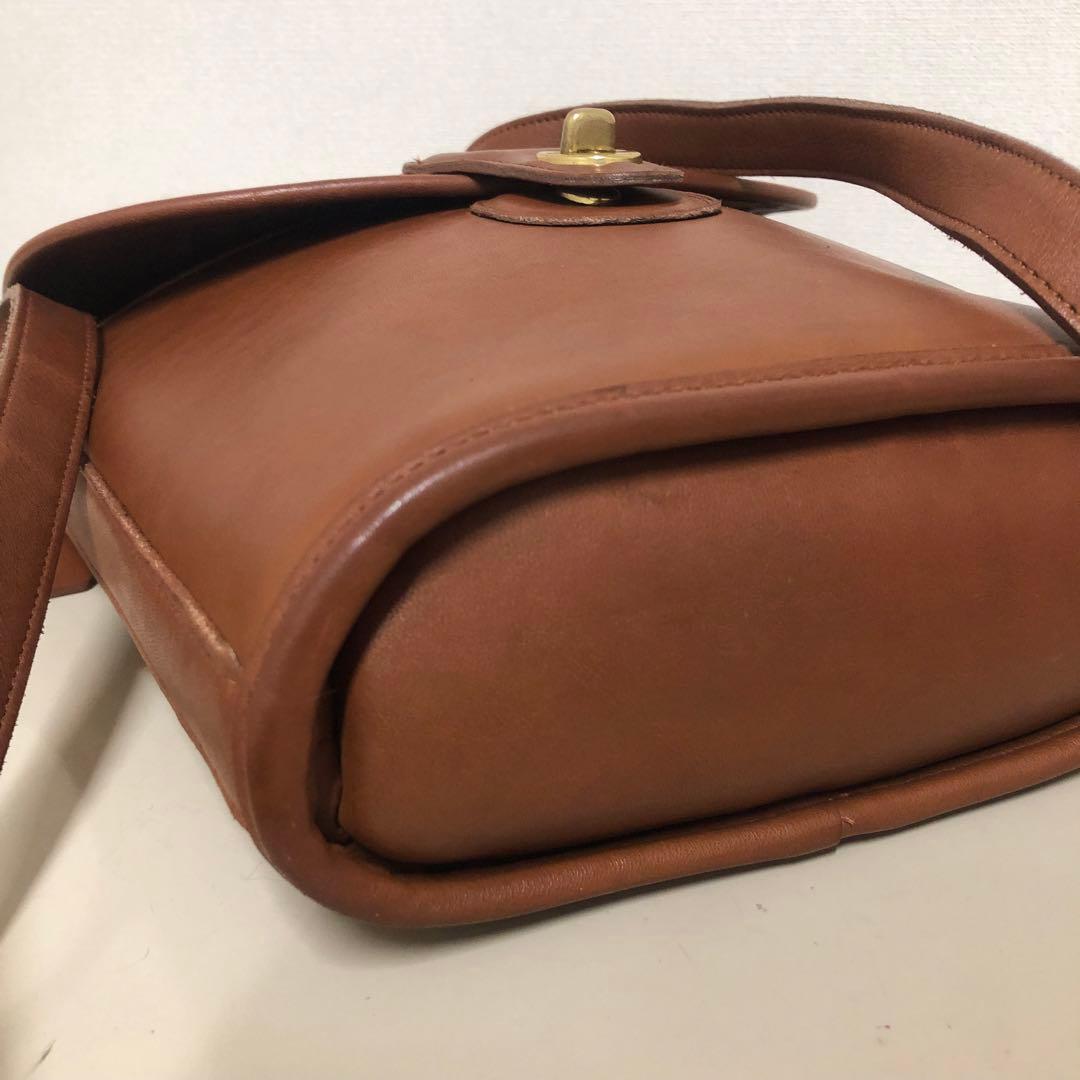 COACH ショルダーバッグ クロスボディ バケツ型 レザー 茶色　ターンロック