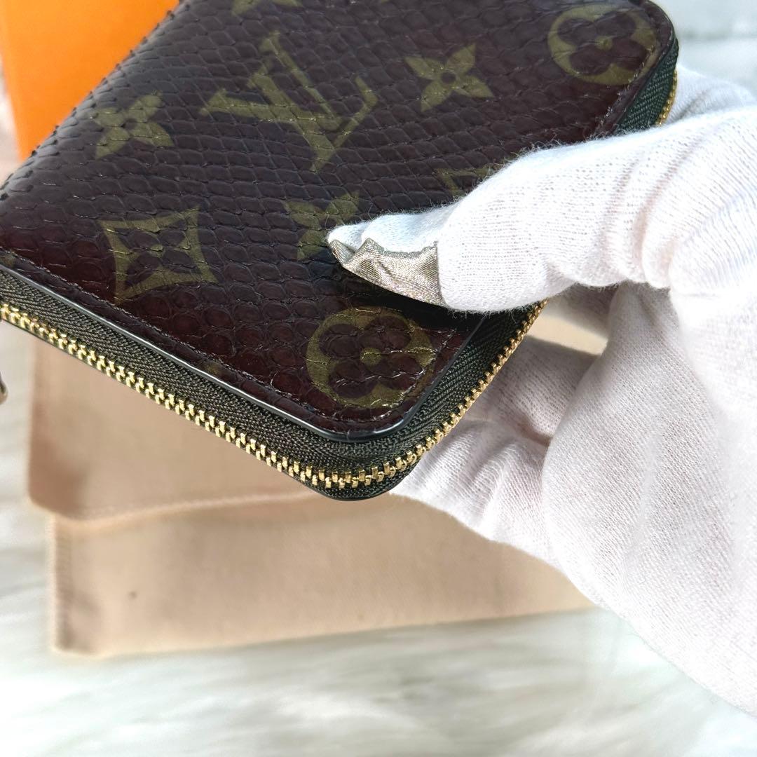 美品 ルイヴィトン パイソン モノグラム ジッピーパース ラウンド 茶色