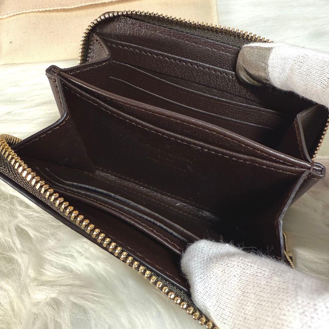美品 ルイヴィトン パイソン モノグラム ジッピーパース ラウンド 茶色